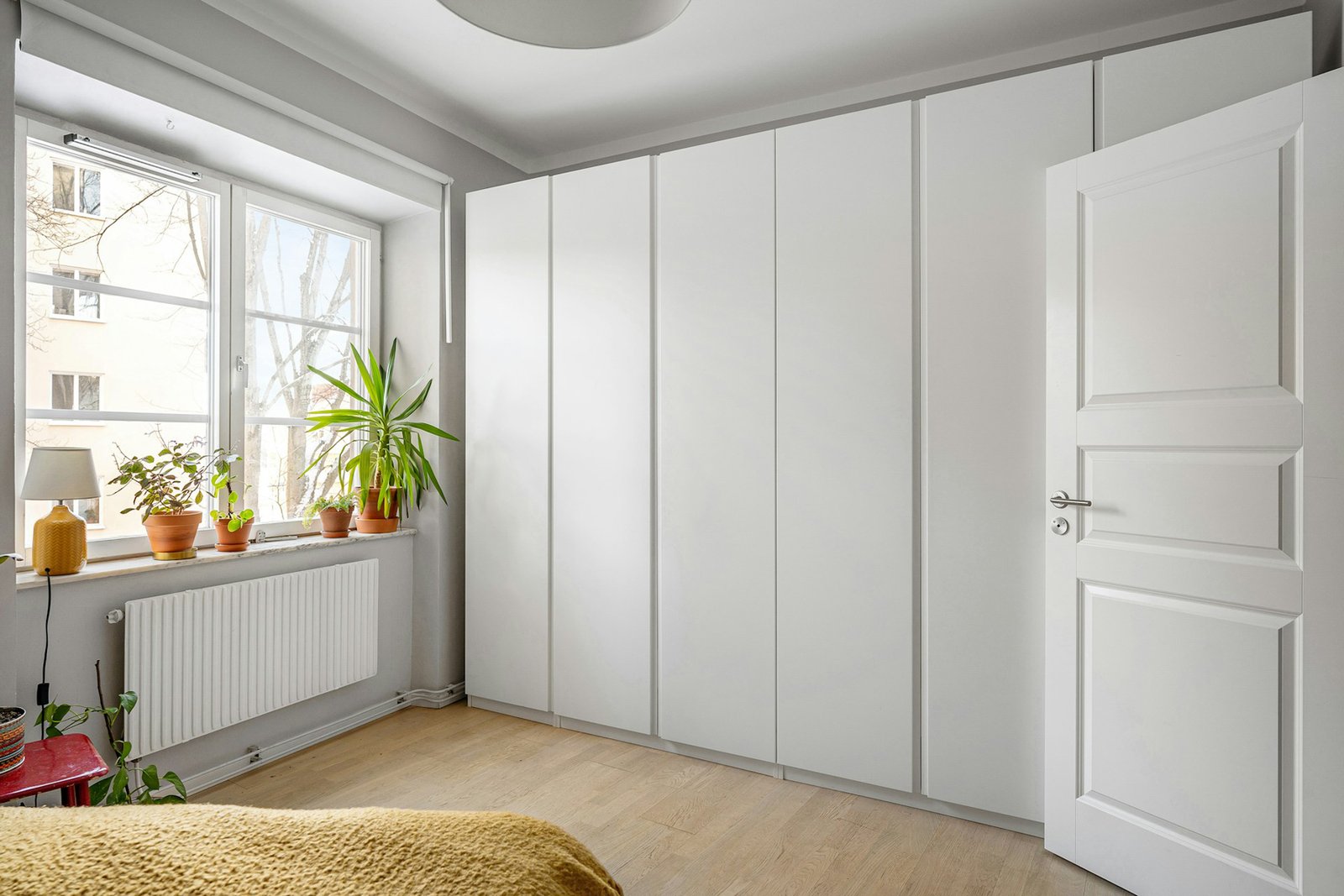 Thermostatregler an einem Heizkörper